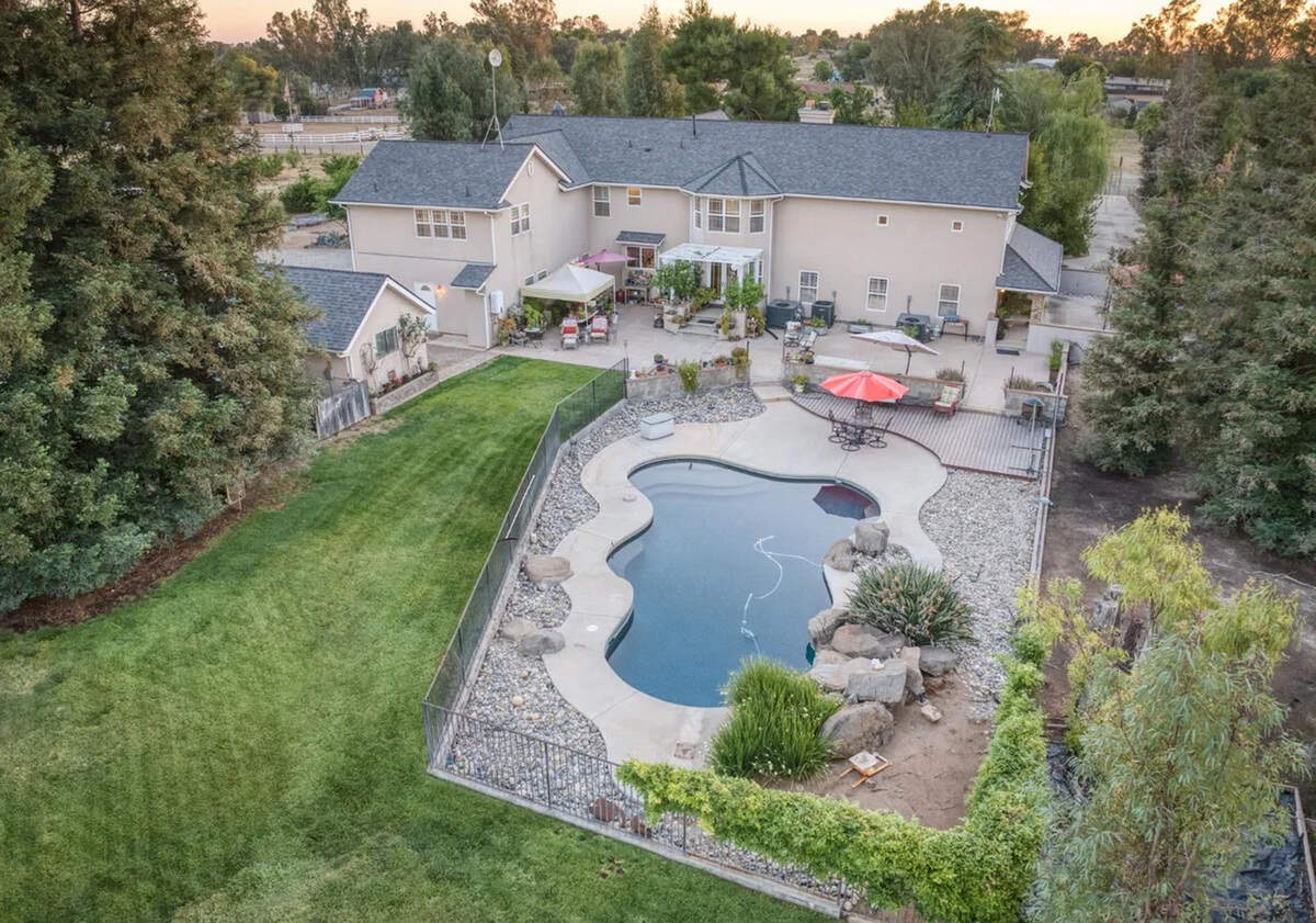 Located a couple of miles east of Highway 168 and just south of Shepherd Avenue, the property at 8584 N. Madsen Ave. sits on 18.4 acres.
